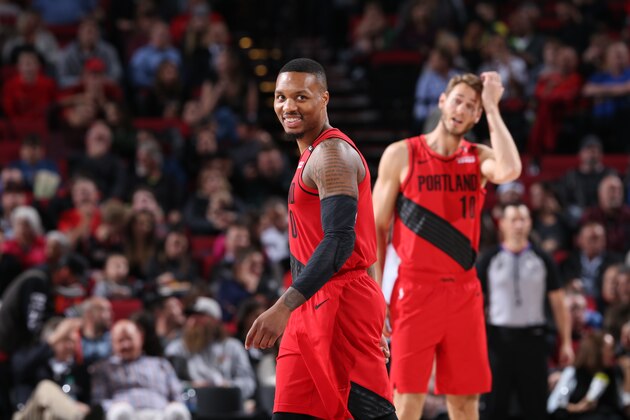 PORTLAND, OR - NOVEMBER 8: Portland Trail Blazers guard Damian Lillard #0 enjoys a laugh during the game against the LA Clippers on November 8, 2018 at the Moda Center Arena in Portland, Oregon. NOTE TO USER: User expressly acknowledges and agrees that, by downloading and or using this photograph, user is consenting to the terms and conditions of the Getty Images License Agreement. Mandatory Copyright Notice: Copyright 2018 NBAE (Photo by Sam Forencich/NBAE via Getty Images)