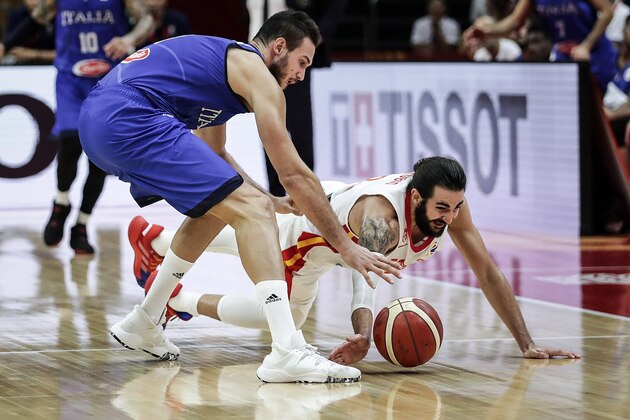 WUHAN, CHINA - SEPTEMBER 06:  Ricky Rubio #9 of Spain in action against  Danilo Gallinari #8 of Italy during FIBA World Cup 2019 Group J match between Spain and Italy at Wuhan Sports Centre  on September 06 , 2019 in Wuhan, China.  (Photo by Wang He/Getty Images)