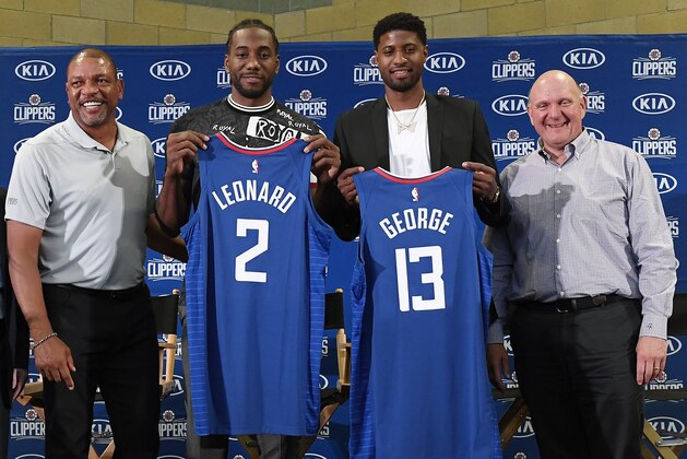LOS ANGELES, CA - JULY 24: (L-R) Head coach Doc Rivers, Paul George, Kawhi Leonard and owner Steve Ballmer of the Los Angeles Clippers attend the Paul George and Kawhi Leonard introductory press conference at Green Meadows Recreation Center on July 24, 2019 in Los Angeles, California. NOTE TO USER: User expressly acknowledges and agrees that, by downloading and or using this photograph, User is consenting to the terms and conditions of the Getty Images License Agreement. (Photo by Kevork Djansezian/Getty Images)