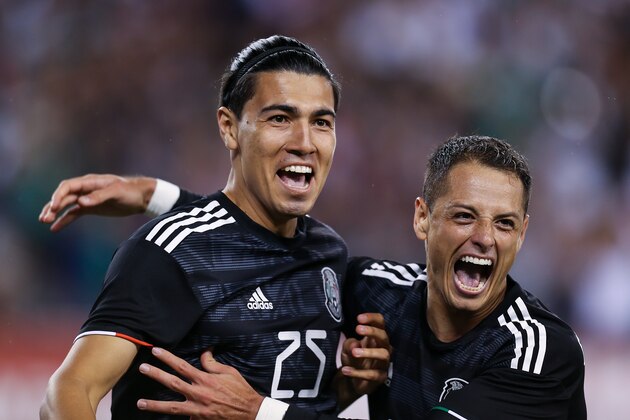 EAST RUTHERFORD, NJ - SEPTEMBER 06: Erick Gutierrez #25 and Javier Hernandez #14 of Mexico celebrate the 2nd goal during the international friendly match between Mexico and USA at MetLife Stadium on September 6, 2019 in East Rutherford, New Jersey. (Photo by Omar Vega/Getty Images)