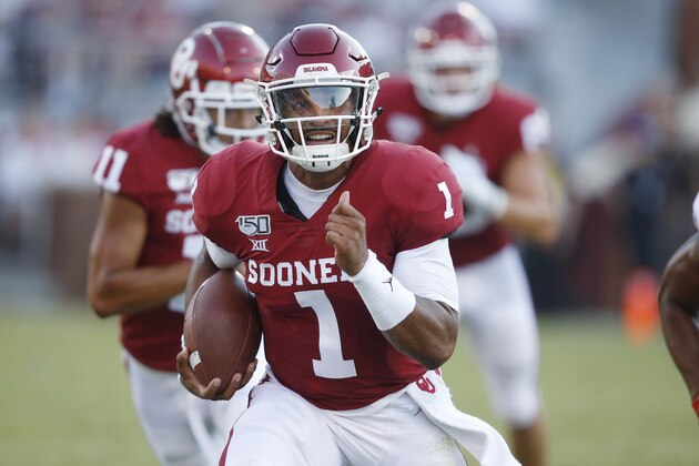 Oklahoma quarterback Jalen Hurts (1) carries in the second quarter of an NCAA college football game against South Dakota Saturday, Sept. 7, 2019, in Norman, Okla. (AP Photo/Sue Ogrocki)