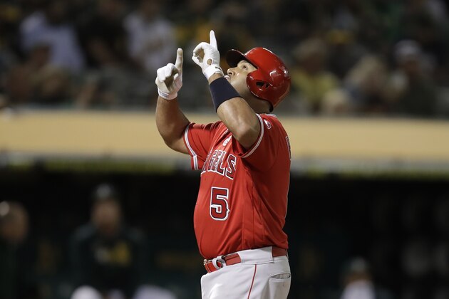 Los Angeles Angels' Albert Pujols celebrates after hitting a home run off Oakland Athletics' Mike Fiers during the fourth inning of a baseball game Tuesday, Sept. 3, 2019, in Oakland, Calif. (AP Photo/Ben Margot)