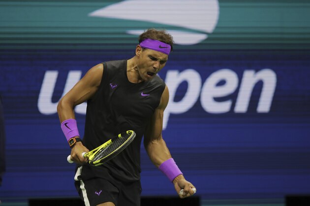 Rafael Nadal, of Spain, reacts after winning the first set against Matteo Berrettini, of Italy, during the men's singles semifinals of the U.S. Open tennis championships Friday, Sept. 6, 2019, in New York. (AP Photo/Charles Krupa)