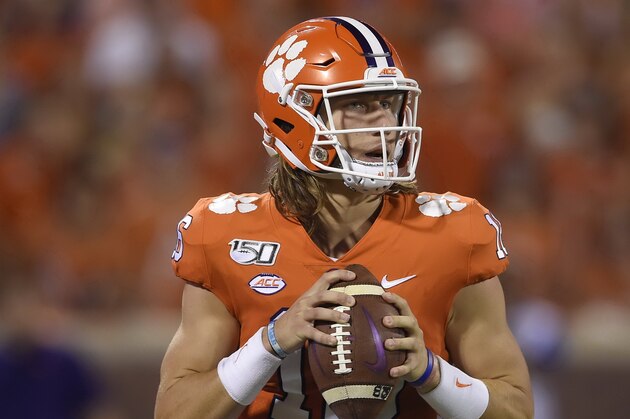 Clemson's Trevor Lawrence looks to throw the ball during an NCAA football game on Thursday, Aug. 29, 2019 in Clemson, S.C. (AP Photo/Richard Shiro)