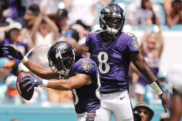 MIAMI, FLORIDA - SEPTEMBER 08: Willie Snead #83 of the Baltimore Ravens celebrates with Lamar Jackson #8 after scoring a touchdown against the Miami Dolphins during the second quarter at Hard Rock Stadium on September 08, 2019 in Miami, Florida. (Photo by Michael Reaves/Getty Images)