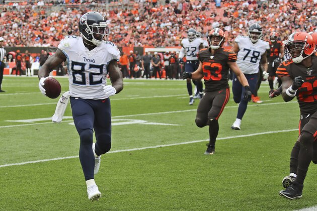 Tennessee Titans tight end Delanie Walker scores a touchdown during the second half in an NFL football game Cleveland Browns, Sunday, Sept. 8, 2019, in Cleveland. (AP Photo/Ron Schwane) Tennessee Titans tight end Delanie Walker scores a touchdown during the second half in an NFL football game Cleveland Browns, Sunday, Sept. 8, 2019, in Cleveland. (AP Photo/Ron Schwane)