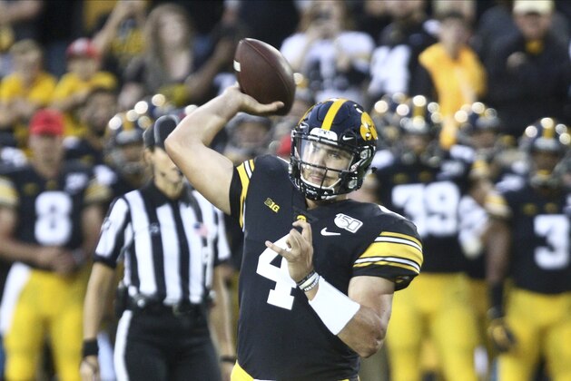 IOWA CITY, IOWA - AUGUST 31: Quarterback Nate Stanley #4 of the Iowa Hawkeyes throws a pass during the first half against the Miami Ohio RedHawks on August 31, 2019 at Kinnick Stadium in Iowa City, Iowa. (Photo by Matthew Holst/Getty Images)