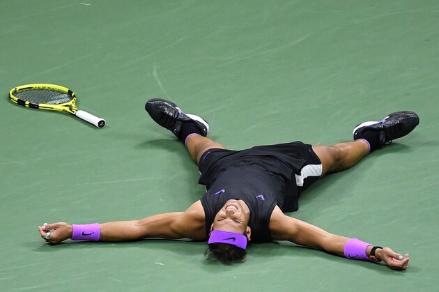 NEW YORK, NEW YORK - SEPTEMBER 08: Rafael Nadal of Spain celebrates after winning his Men's Singles final match against Daniil Medvedev of Russia on day fourteen of the 2019 US Open at the USTA Billie Jean King National Tennis Center on September 08, 2019 in the Queens borough of New York City. (Photo by Emilee Chinn/Getty Images) NEW YORK, NEW YORK - SEPTEMBER 08: Rafael Nadal of Spain celebrates after winning his Men's Singles final match against Daniil Medvedev of Russia on day fourteen of the 2019 US Open at the USTA Billie Jean King National Tennis Center on September 08, 2019 in the Queens borough of New York City. (Photo by Emilee Chinn/Getty Images)