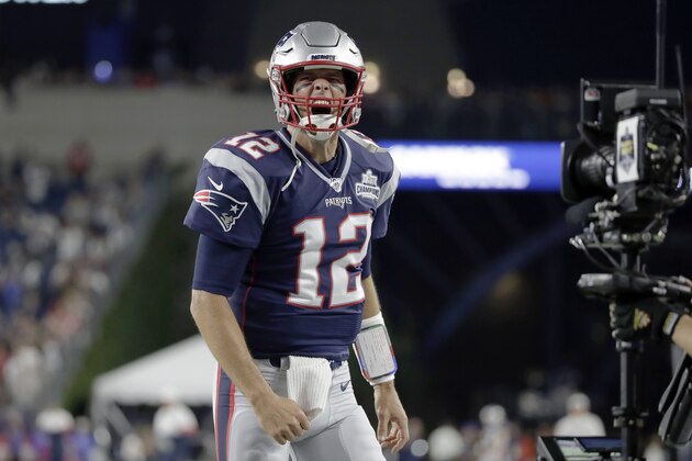 New England Patriots quarterback Tom Brady charges onto the field to warm up before an NFL football game against the Pittsburgh Steelers, Sunday, Sept. 8, 2019, in Foxborough, Mass. (AP Photo/Elise Amendola)