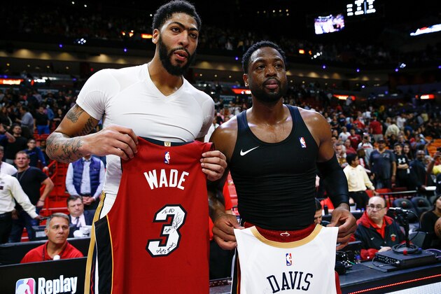 MIAMI, FL - NOVEMBER 30:  Dwyane Wade #3 of the Miami Heat exchanges jerseys with Anthony Davis #23 of the New Orleans Pelicans after the game at American Airlines Arena on November 30, 2018 in Miami, Florida. NOTE TO USER: User expressly acknowledges and agrees that, by downloading and or using this photograph, User is consenting to the terms and conditions of the Getty Images License Agreement.  (Photo by Michael Reaves/Getty Images)