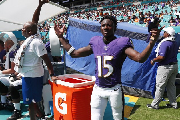 Baltimore Ravens wide receiver Marquise Brown (15) gestures during the last minutes of the second half at an NFL football game against the Miami Dolphins, Sunday, Sept. 8, 2019, in Miami Gardens, Fla. The Ravens defeated the Dolphins 59-10. (AP Photo/Wilfredo Lee)