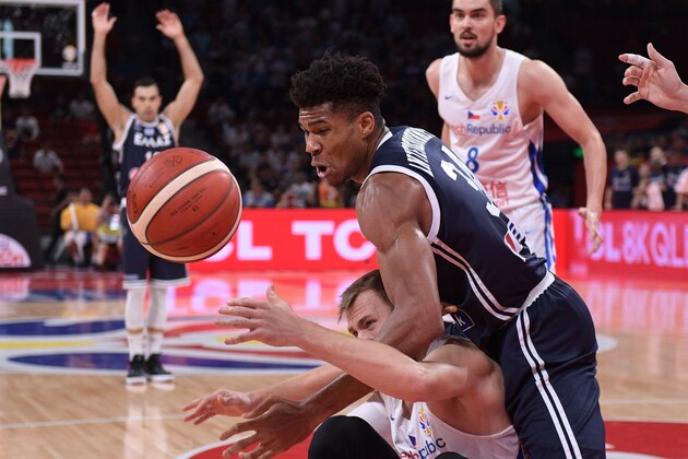 Martin Kriz (bottom) of the Czech Republic and Greece's Giannis Antetokounmpo fight for the ball during the Basketball World Cup Group K second round game between Czech Republic and Greece in Shenzhen on September 9, 2019. (Photo by Nicolas ASFOURI / AFP)        (Photo credit should read NICOLAS ASFOURI/AFP/Getty Images)