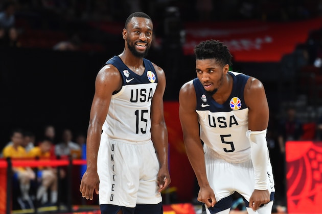 SHENZHEN, CHINA - SEPTEMBER 9: Kemba Walker #15 of Team USA and Donovan Mitchell #5 of Team USA shares a laugh during the game against Team Brazil during the FIBA World Cup on September 9, 2019 at the Shenzhen Bay Sports Center in Shenzhen, China. NOTE TO USER: User expressly acknowledges and agrees that, by downloading and/or using this photograph, user is consenting to the terms and conditions of the Getty Images License Agreement. Mandatory Copyright Notice: Copyright 2019 NBAE  (Photo by Jesse D. Garrabrant/NBAE via Getty Images)
