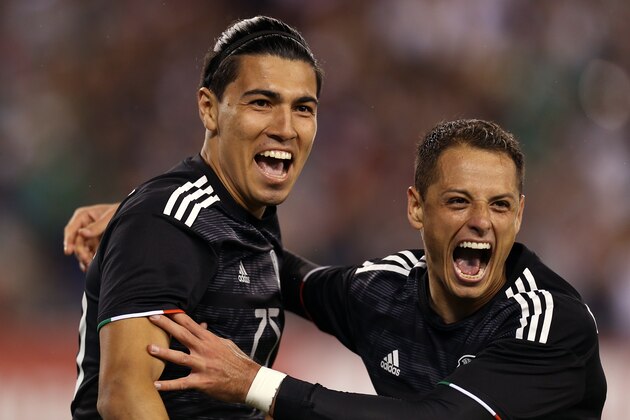 EAST RUTHERFORD, NJ - SEPTEMBER 06: Erick Gutierres #25 and Javier Hernandez #14 of Mexico celebrates the second goal of their team during the international friendly match between Mexico and USA at MetLife Stadium on September 6, 2019 in East Rutherford, New Jersey. (Photo by Omar Vega/Getty Images)