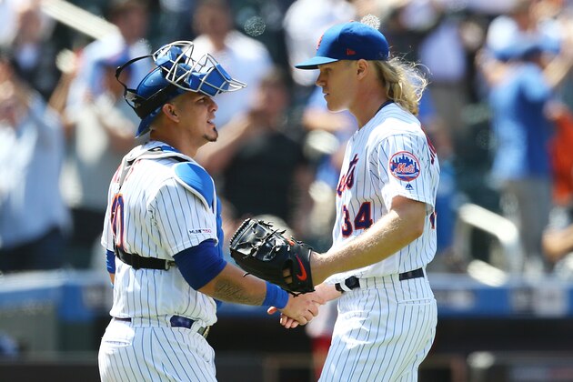 NEW YORK, NEW YORK - MAY 02: Noah Syndergaard #34 of the New York Mets celebrates with Wilson Ramos #40 after pitching a complete game shutout against the Cincinnati Reds at Citi Field on May 02, 2019 in the Queens borough of New York City. New York Mets defeated the Cincinnati Reds 1-0. (Photo by Mike Stobe/Getty Images)
