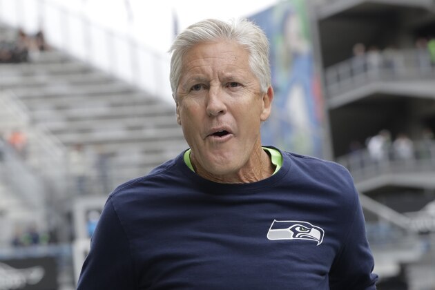 Seattle Seahawks head coach Pete Carroll jogs on the field before an NFL football game against the Cincinnati Bengals, Sunday, Sept. 8, 2019, in Seattle. (AP Photo/John Froschauer)