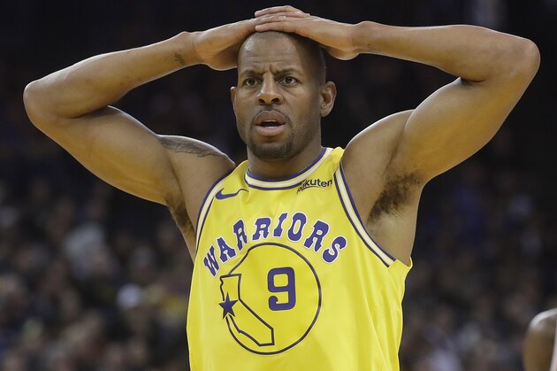 Golden State Warriors guard Andre Iguodala (9) against the Phoenix Suns during an NBA basketball game in Oakland, Calif., Sunday, March 10, 2019. (AP Photo/Jeff Chiu)