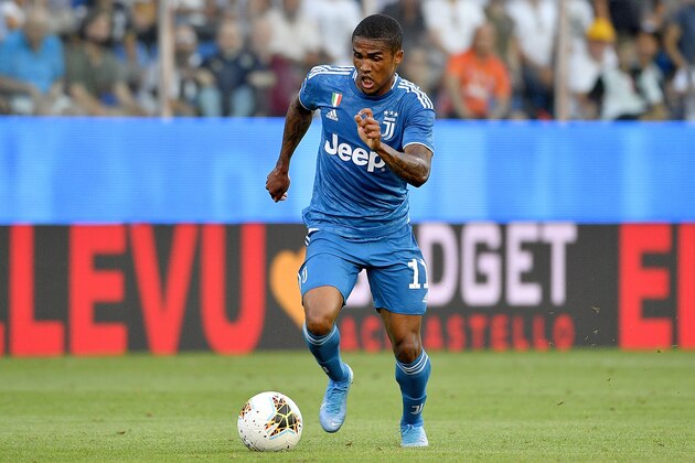 PARMA, ITALY - AUGUST 24: Douglas Costa of Juventus  during the Italian Serie A   match between Parma v Juventus at the Stadio Ennio Tardini on August 24, 2019 in Parma Italy (Photo by Mattia Ozbot/Soccrates/Getty Images)