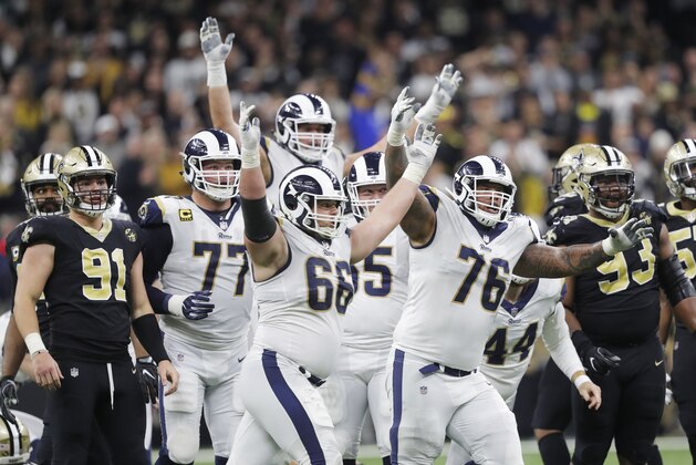 Los Angeles Rams players celebrate after overtime of the NFL football NFC championship game against the New Orleans Saints, Sunday, Jan. 20, 2019, in New Orleans. The Rams won 26-23. (AP Photo/Gerald Herbert)
