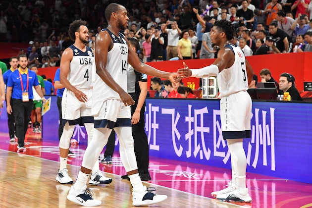SHENZHEN, CHINA - SEPTEMBER 9: Khris Middleton #14, and Donovan Mitchell #5 of USA hi-five each other against Team Brazil during the FIBA World Cup on September 9, 2019 at the Shenzhen Bay Sports Center in Shenzhen, China. NOTE TO USER: User expressly acknowledges and agrees that, by downloading and/or using this photograph, user is consenting to the terms and conditions of the Getty Images License Agreement. Mandatory Copyright Notice: Copyright 2019 NBAE (Photo by Jesse D. Garrabrant/NBAE via Getty Images) SHENZHEN, CHINA - SEPTEMBER 9: Khris Middleton #14, and Donovan Mitchell #5 of USA hi-five each other against Team Brazil during the FIBA World Cup on September 9, 2019 at the Shenzhen Bay Sports Center in Shenzhen, China. NOTE TO USER: User expressly acknowledges and agrees that, by downloading and/or using this photograph, user is consenting to the terms and conditions of the Getty Images License Agreement. Mandatory Copyright Notice: Copyright 2019 NBAE (Photo by Jesse D. Garrabrant/NBAE via Getty Images)