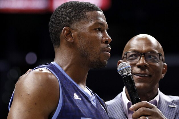 LOS ANGELES, CALIFORNIA - SEPTEMBER 01: Joe Johnson #1 of the Triplets is awarded the MVP trophy by BIG3 commissioner Clyde Drexler during the BIG3 Championship at Staples Center on September 01, 2019 in Los Angeles, California. (Photo by Meg Oliphant/BIG3 via Getty Images)