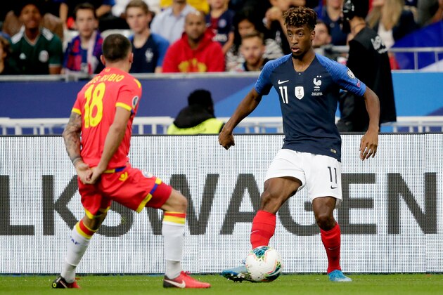 PARIS, FRANCE - SEPTEMBER 10: (L-R) Chus Rubio of Andorra, Kingsley Coman of France  during the  EURO Qualifier match between France  v Andorra  at the Stade de France on September 10, 2019 in Paris France (Photo by Erwin Spek/Soccrates/Getty Images)