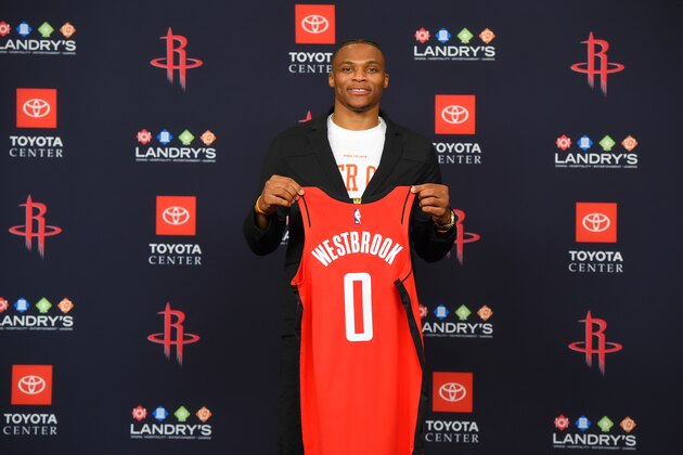 HOUSTON, TX - JULY 26: Russell Westbrook #0 of the Houston Rockets pose for a photo during the Houston Rockets Introductory Press Conference on July 26, 2019 at the Toyota Center in Houston, Texas. NOTE TO USER: User expressly acknowledges and agrees that, by downloading and or using this photograph, User is consenting to the terms and conditions of the Getty Images License Agreement. Mandatory Copyright Notice: Copyright 2019 NBAE (Photo by Bill Baptist/NBAE via Getty Images) HOUSTON, TX - JULY 26: Russell Westbrook #0 of the Houston Rockets pose for a photo during the Houston Rockets Introductory Press Conference on July 26, 2019 at the Toyota Center in Houston, Texas. NOTE TO USER: User expressly acknowledges and agrees that, by downloading and or using this photograph, User is consenting to the terms and conditions of the Getty Images License Agreement. Mandatory Copyright Notice: Copyright 2019 NBAE (Photo by Bill Baptist/NBAE via Getty Images)