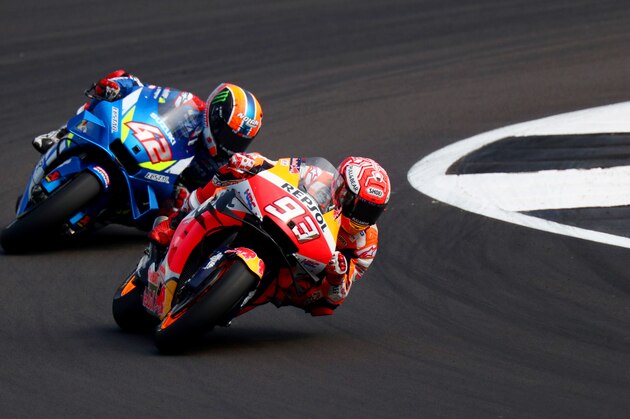 NORTHAMPTON, ENGLAND - AUGUST 25: Marc Marquez of Spain and Repsol Honda leads Alex Rins of Spain and Team Suzuki Ecstar during the MotoGP of Great Britain at Silverstone Circuit on August 25, 2019 in Northampton, England. (Photo by Dan Istitene/Getty Images) NORTHAMPTON, ENGLAND - AUGUST 25: Marc Marquez of Spain and Repsol Honda leads Alex Rins of Spain and Team Suzuki Ecstar during the MotoGP of Great Britain at Silverstone Circuit on August 25, 2019 in Northampton, England. (Photo by Dan Istitene/Getty Images)
