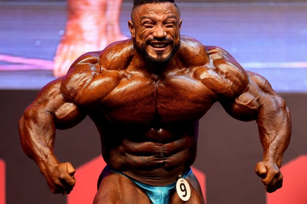 Curacao bodybuilder Roelly Winklaar performs during the Kuwait Pro bodybuilding tournament in Kuwait City on September 29, 2016. / AFP / Yasser Al-Zayyat        (Photo credit should read YASSER AL-ZAYYAT/AFP/Getty Images)