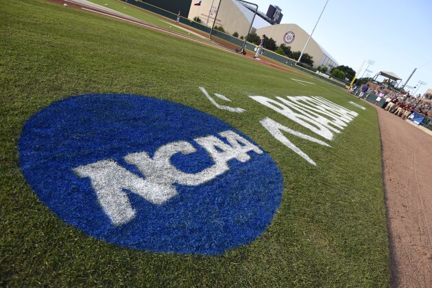 The NCAA logo is painted alongside the visitor dugout at Olsen Field before the start of a NCAA college baseball super regional tournament game between TCU and Texas A&M, Friday, June 10, 2016, in College Station, Texas. TCU won game one of the series 8-2. (AP Photo/Sam Craft)