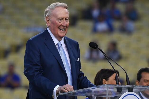 LOS ANGELES, CA - SEPTEMBER 21:  Retired Dodgers broadcaster Vin Scully, left speaks during a pregame ceremony honoring language broadcaster Jaime Jarrin inducting him into the Dodger Stadium Ring of Honor at Dodger Stadium on September 2, 2018 in Los Angeles, California.  (Photo by Jayne Kamin-Oncea/Getty Images)