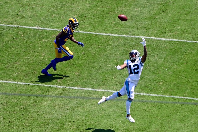 CHARLOTTE, NORTH CAROLINA - SEPTEMBER 08: D.J. Moore #12 of the Carolina Panthers leaps for the ball in the first quarter during their game against the Los Angeles Rams at Bank of America Stadium on September 08, 2019 in Charlotte, North Carolina. (Photo by Jacob Kupferman/Getty Images)