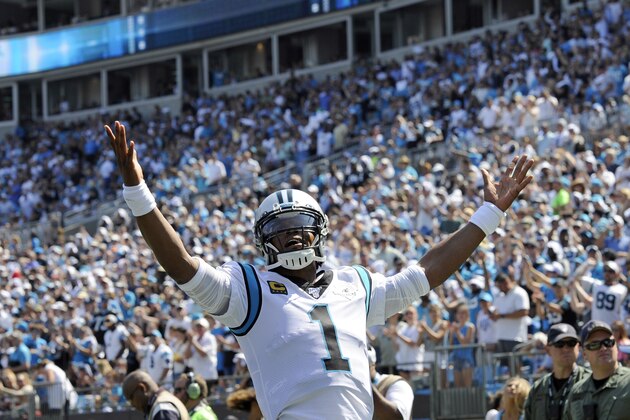 Carolina Panthers quarterback Cam Newton (1) celebrates following running back Christian McCaffrey's touchdown against the Los Angeles Rams during the second half of an NFL football game in Charlotte, N.C., Sunday, Sept. 8, 2019. (AP Photo/Mike McCarn)