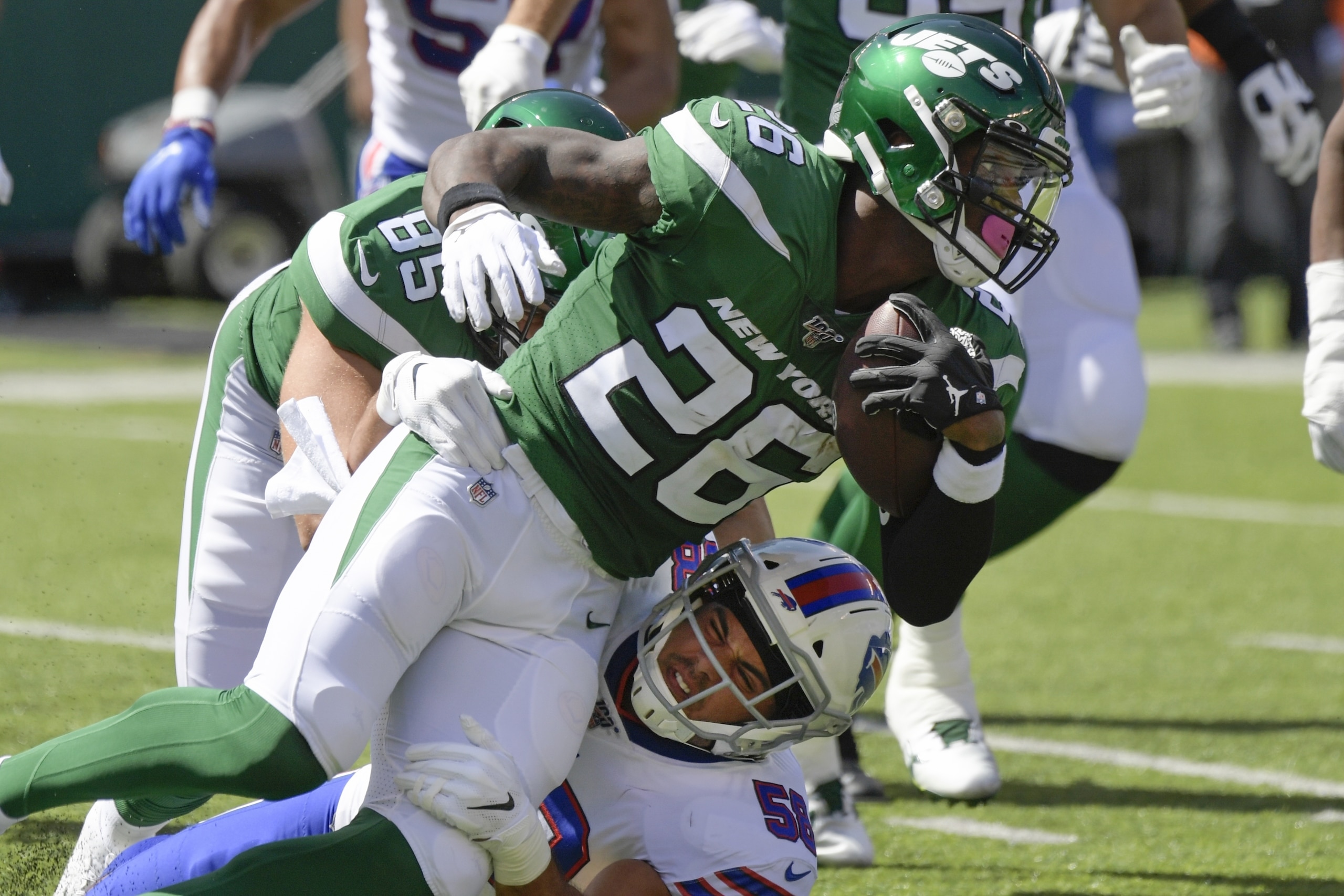 Buffalo Bills' Matt Milano (58) tackles New York Jets' Le'Veon Bell (26) during the first half of an NFL football game Sunday, Sept. 8, 2019, in East Rutherford, N.J. (AP Photo/Bill Kostroun)
