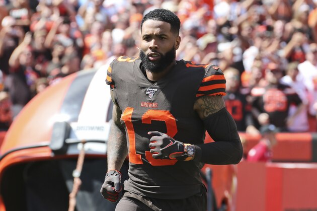 Cleveland Browns wide receiver Odell Beckham Jr. is introduced as he runs out on the field before an NFL football game against the Tennessee Titans, Sunday, Sept. 8, 2019, in Cleveland. The flashy, fashionable wide receiver sported an expensive watch, worth over $250,000, during his debut Sunday. The NFL plans to speak with Browns star Odell Beckham Jr. about wearing a watch in games. (AP Photo/Ron Schwane)