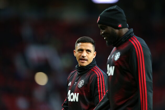 MANCHESTER, ENGLAND - APRIL 24:  Alexis Sanchez of Manchester United talks with Romelu Lukaku prior to the Premier League match between Manchester United and Manchester City at Old Trafford on April 24, 2019 in Manchester, United Kingdom. (Photo by Alex Livesey - Danehouse/Getty Images )