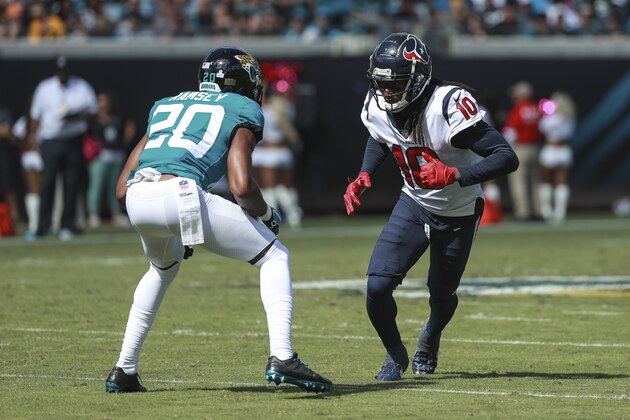 JACKSONVILLE, FL - OCTOBER 21: DeAndre Hopkins #10 of the Houston Texans and Jalen Ramsey #20 of the Jacksonville Jaguars face off during the first half at TIAA Bank Field on October 21, 2018 in Jacksonville, Florida.  (Photo by Scott Halleran/Getty Images)