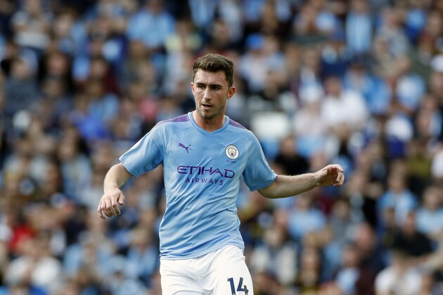 Manchester City's Aymeric Laporte runs for the ball during the English Premier League soccer match between Manchester City and Tottenham Hotspur at Etihad stadium in Manchester, England, Saturday, Aug. 17, 2019. (AP Photo/Rui Vieira)