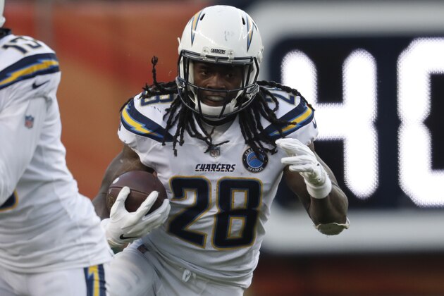 Los Angeles Chargers running back Melvin Gordon rushes during the second half of an NFL football game against the Denver Broncos, Sunday, Dec. 30, 2018, in Denver. (AP Photo/David Zalubowski)