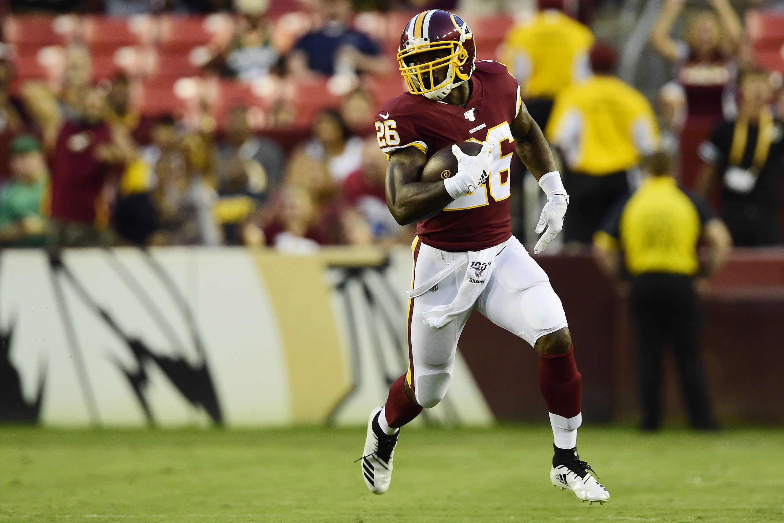 LANDOVER, MD - AUGUST 15: Adrian Peterson #26 of the Washington Redskins runs with the ball in the first quarter against the Cincinnati Bengals during a preseason game at FedExField on August 15, 2019 in Landover, Maryland. (Photo by Patrick McDermott/Getty Images) LANDOVER, MD - AUGUST 15: Adrian Peterson #26 of the Washington Redskins runs with the ball in the first quarter against the Cincinnati Bengals during a preseason game at FedExField on August 15, 2019 in Landover, Maryland. (Photo by Patrick McDermott/Getty Images)