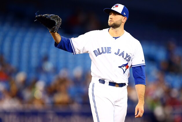 TORONTO, ON - AUGUST 16:  Tim Mayza #58 of the Toronto Blue Jays pitches in the sixth inning during a MLB game against the Seattle Mariners at Rogers Centre on August 16, 2019 in Toronto, Canada.  (Photo by Vaughn Ridley/Getty Images)