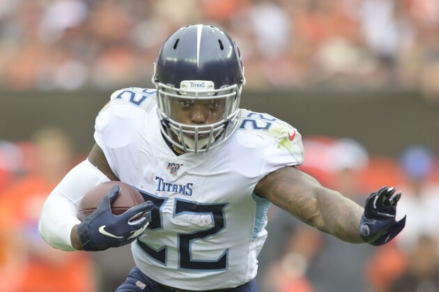 Tennessee Titans running back Derrick Henry (22) runs with the football in the first half of an NFL football game against the Cleveland Browns, Sunday, Sept. 8, 2019, in Cleveland. Tennessee won 43-13. (AP Photo/David Richard)