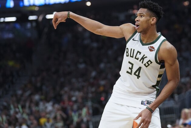 Milwaukee Bucks' Giannis Antetokounmpo watches a shot during the first half of Game 5 of the NBA Eastern Conference basketball playoff finals against the Toronto Raptors Thursday, May 23, 2019, in Milwaukee. (AP Photo/Morry Gash)