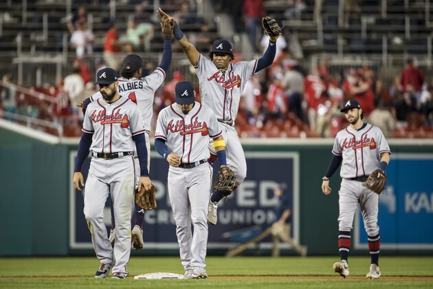 WASHINGTON, DC - SEPTEMBER 13: Ronald Acuna Jr. #13 of the Atlanta Braves celebrates with teammates after the game against the Washington Nationals at Nationals Park on September 13, 2019 in Washington, DC. (Photo by Scott Taetsch/Getty Images)