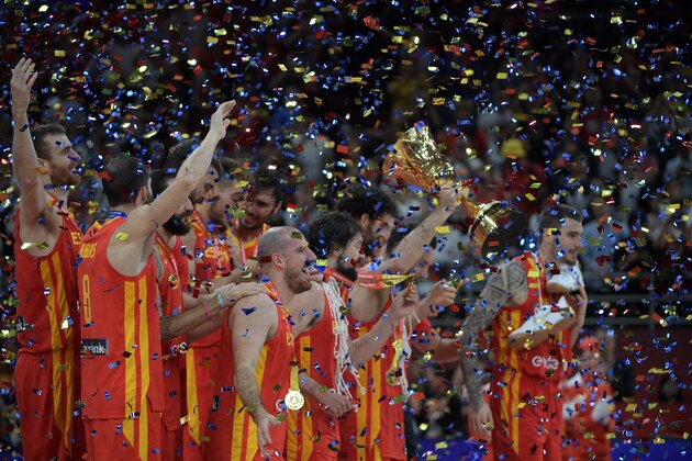 Spain's players celebrates on the podium with the trophy at the end of the Basketball World Cup final game between Argentina and Spain in Beijing on September 15, 2019. (Photo by NOEL CELIS / AFP)        (Photo credit should read NOEL CELIS/AFP/Getty Images)