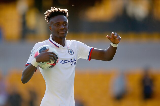WOLVERHAMPTON, ENGLAND - SEPTEMBER 14: Tammy Abraham of Chelsea claims the matchball following the Premier League match between Wolverhampton Wanderers and Chelsea FC at Molineux on September 14, 2019 in Wolverhampton, United Kingdom. (Photo by Malcolm Couzens/Getty Images)