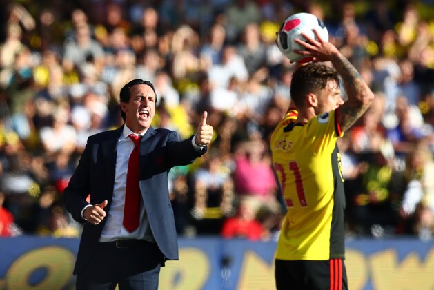 WATFORD, ENGLAND - SEPTEMBER 15:  Unai Emery, Manager of Arsenal reacts as Kiko Femenia of Watford take a throw in during the Premier League match between Watford FC and Arsenal FC at Vicarage Road on September 15, 2019 in Watford, United Kingdom. (Photo by Julian Finney/Getty Images)
