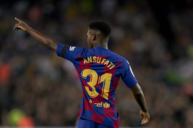BARCELONA, SPAIN - SEPTEMBER 14: Ansu Fati of FC Barcelona celebrates scoring his team's first goal during the La Liga match between FC Barcelona and Valencia CF at Camp Nou on September 14, 2019 in Barcelona, Spain. (Photo by Quality Sport Images/Getty Images)