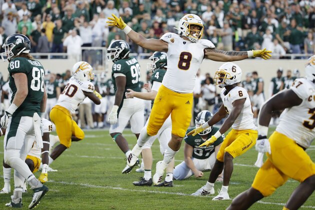 EAST LANSING, MI - SEPTEMBER 14: Merlin Robertson #8 of the Arizona State Sun Devils celebrates after a missed field goal by the Michigan State Spartans as time expired in the game at Spartan Stadium on September 14, 2019 in East Lansing, Michigan. Arizona State defeated Michigan State 10-7. (Photo by Joe Robbins/Getty Images) EAST LANSING, MI - SEPTEMBER 14: Merlin Robertson #8 of the Arizona State Sun Devils celebrates after a missed field goal by the Michigan State Spartans as time expired in the game at Spartan Stadium on September 14, 2019 in East Lansing, Michigan. Arizona State defeated Michigan State 10-7. (Photo by Joe Robbins/Getty Images)