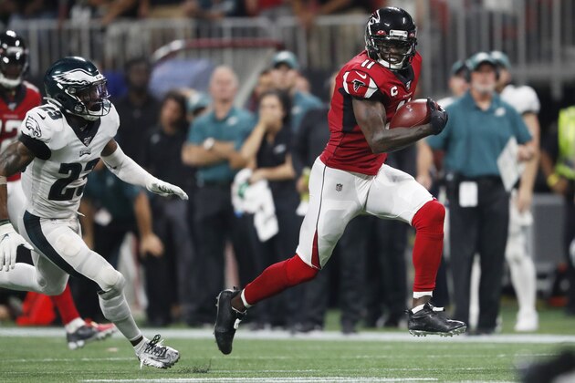 Atlanta Falcons wide receiver Julio Jones (11) runs toward the end zone for a touchdown against Philadelphia Eagles free safety Rodney McLeod (23) during the second half of an NFL football game, Sunday, Sept. 15, 2019, in Atlanta. (AP Photo/John Bazemore)